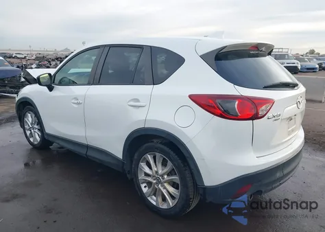 2015 Mazda Cx-5 Grand Touring z USA, uszkodzony, nr VIN JM3KE4DY0F0521074